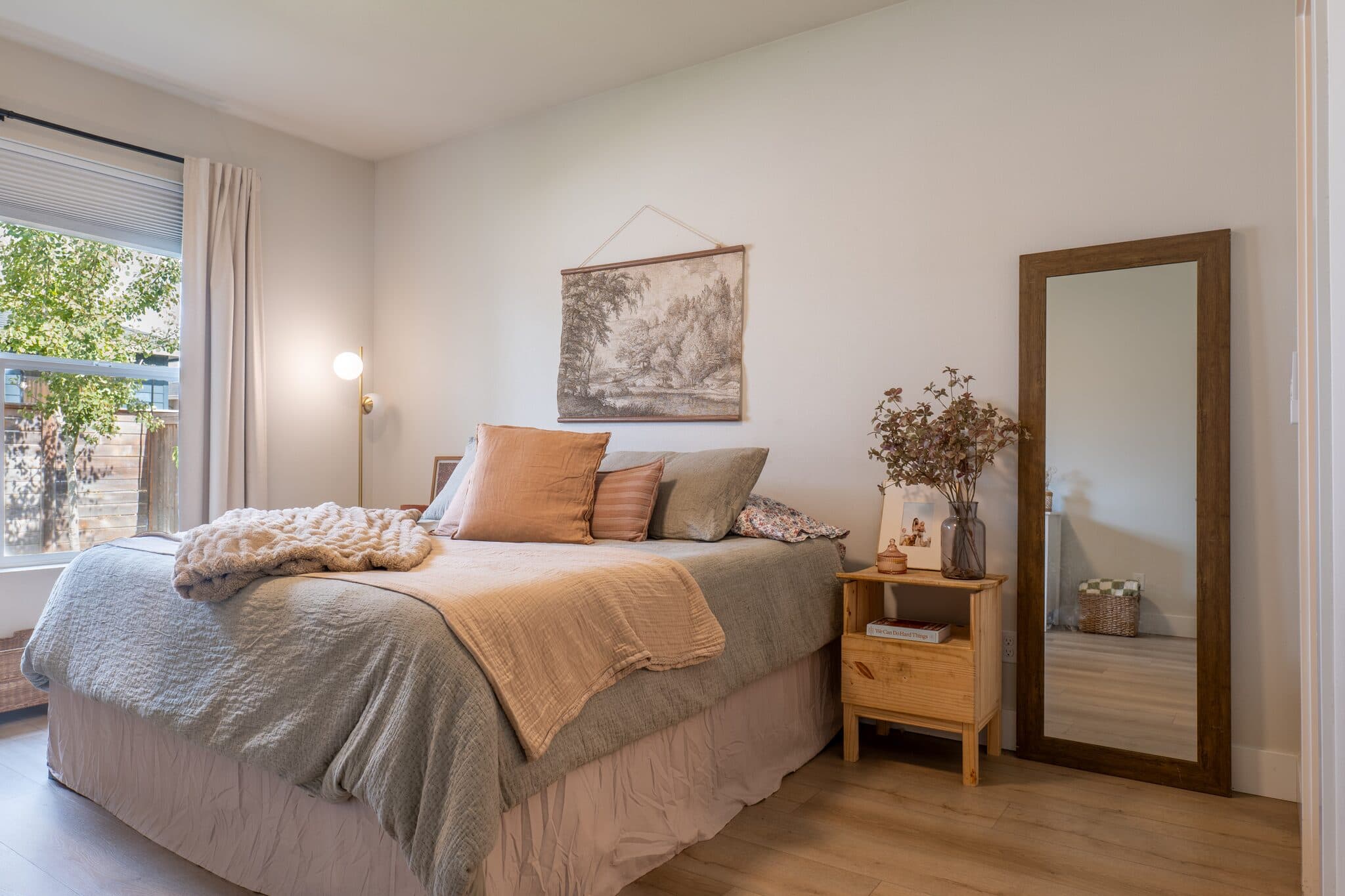 Primary bedroom with soft natural light — real estate photography by Hahn Media, Oregon